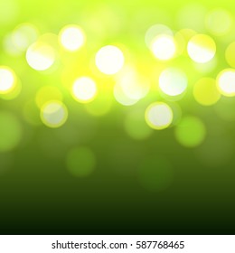 Abstract glowing green background with bokeh light and sun beams