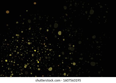Abstract gold bokeh with black background