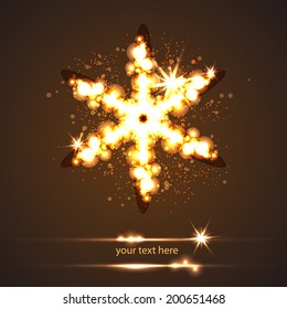 abstract gold flower or snowflake with light effect