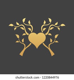 Abstract gold heart tree concept on a black background. Tree in heart.