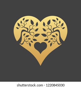 Abstract gold heart tree concept on a black background. Tree in heart.