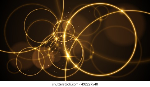 Abstract gold rings on black background