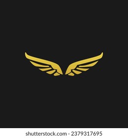 Abstract gold wings on dark background.