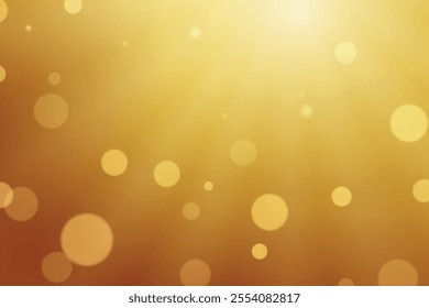 Abstract golden background featuring soft bokeh lights and glowing sun rays in a warm tone