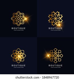 Abstract golden flower or boutique ornament logo set collection. Can be used spa, salon, beauty or boutique logo design.