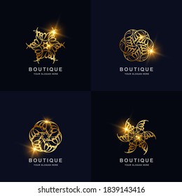 Abstract golden flower or ornament logo set collection. Can be used spa, salon, beauty or boutique logo design.