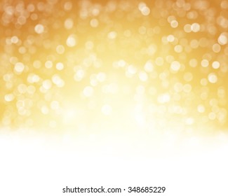 Abstract golden white background with blurry lights that give it a magical feeling as a backdrop for the Christmas season or any festive occasion.