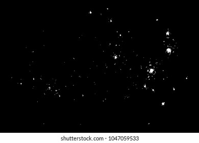 Abstract grainy texture isolated on black background. Top view. Dust, sand blow or bread crumbs. Silhouette of food flakes such as salt or almond or wheat flour spread on the flat surface or table. 