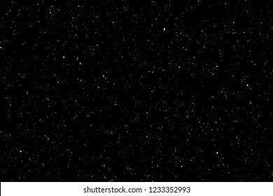 Abstract grainy texture isolated on black background. Top view. Dust, sand blow Silhouette of spread on the flat surface or table. 