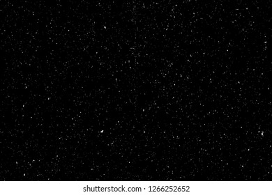 Abstract grainy texture isolated on black background. Top view. Dust, sand blow Silhouette of spread on the flat surface or table. 