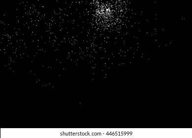 Abstract grainy texture isolated on black background. Silhouette of food flakes such as salt or almond or wheat flour spread on the flat surface or table. Top view. Dust, sand blow or bread crumbs.