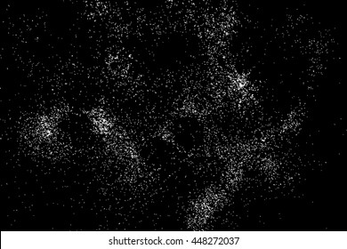 Abstract grainy texture isolated on black background. Silhouette of food flakes such as salt or almond or wheat flour spread on the flat surface or table. Top view. Dust, sand blow or bread crumbs.