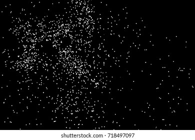 Abstract grainy texture isolated on black background. Top view. Dust, sand blow or bread crumbs. Silhouette of food flakes such as salt or almond or wheat flour spread on the flat surface or table. 