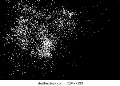 Abstract grainy texture isolated on black background. Top view. Dust, sand blow or bread crumbs. Silhouette of food flakes such as salt or almond or wheat flour spread on the flat surface or table. 