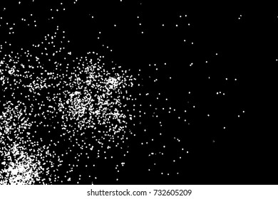 Abstract grainy texture isolated on black background. Top view. Dust, sand blow or bread crumbs. Silhouette of food flakes such as salt or almond or wheat flour spread on the flat surface or table. 