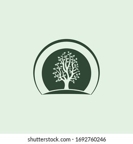 abstract graphic vector illustration of a tree silhouette on a hill against the background of the sun