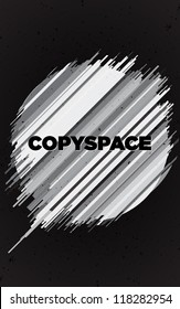 Abstract grayscale circular background with copy space in the middle.