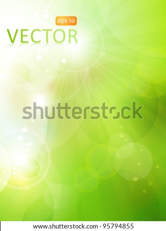 Abstract green blurry background with overlying semitransparent circles, light effects and sun burst. Great spring or green environmental background. Space for your text. EPS10