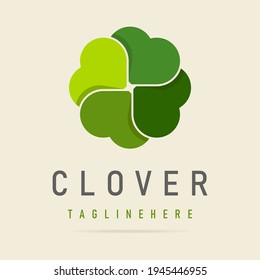 Abstract green clover logo four leaves heart shape,icon irish shamrock luck,sign ecological business company,symbol nature eco.Graphic design template.Simple clean vector logotyp isolated illustration