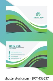 Abstract green color gradient wave shape style business or visiting card template design.