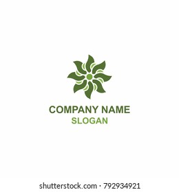 Abstract green flower leaf logo.