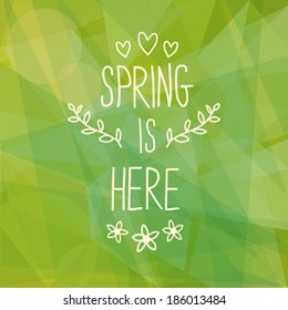 Abstract green geometric background with hand-drawn text.