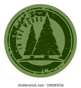 Abstract green grunge camping stamp with firs and the words In the woods written inside. Badges and labels.