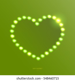 Abstract green heart shape of light bulbs or led diodes. Bright design element for decoration holidays valentine's day.