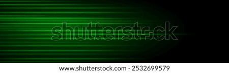 Abstract green laser beam. Lighting effect. Directional spotlight. Light streaks fading into darkness on a black background, creating a dynamic and abstract effect.