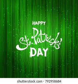 Abstract green painted wood for background or texture. St. Patricks Day. Lettering text and clover leaves. 