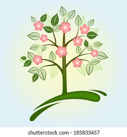 Abstract green spring tree with pink flowers.
