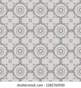 Abstract grey geometric pattern on grey background. Seamless abstract ornament. Vector illustration.