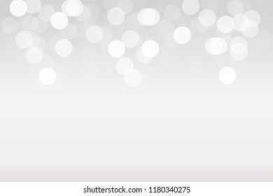 Abstract grey gradient bokeh background with light at top
