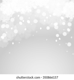 Abstract grey winter background with fir branches and flying snowflakes. Stock vector.