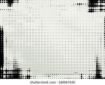 Abstract grunge background with gray and black halftone dots.