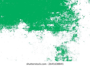 Abstract grunge background with green paint splatter texture on white surface for creative design projects