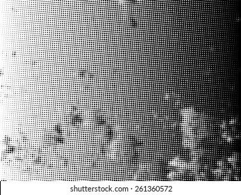 Abstract grunge background with halftone dots. Distressed texture. Vector illustration. 