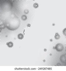 Abstract grunge background with splats and halftone effect.
