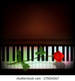 abstract grunge dark background with rose on piano