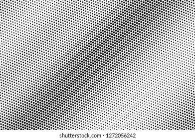 Abstract grunge dotted texture. Black dots on white background. Diagonal dotted gradient. Vintage effect vector overlay. Ink dot pattern. Monochrome halftone texture. Industrial perforated surface