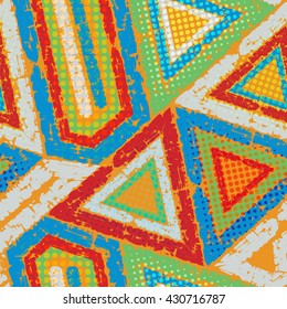 Abstract grunge seamless chaotic pattern with triangular frames, blots, drops and splashes. Trendy colorful texture background. Modern wallpaper. Fashionable print with a shabby paint effect.