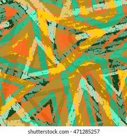 Abstract grunge seamless chaotic pattern with shapes painted by brush. Urban autumn camouflage texture. Trendy colorful background. Modern wallpaper. Fashionable print with a shabby paint effect.