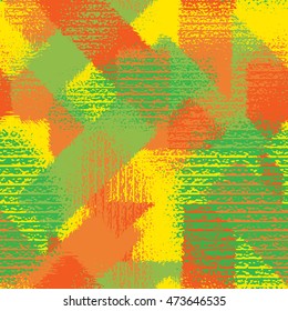 Abstract grunge seamless chaotic pattern with brushstrokes. Urban autumn camouflage texture. Trendy colorful background. Modern wallpaper. Fashionable print with a shabby paint effect.