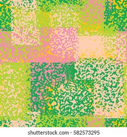Abstract grunge seamless chaotic pattern with brushstrokes. Urban spring camouflage texture. Trendy colorful background. Modern wallpaper. Fashionable print with a shabby paint effect.