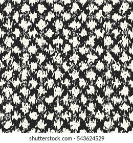 Abstract grunge spotty textured background. Seamless pattern.