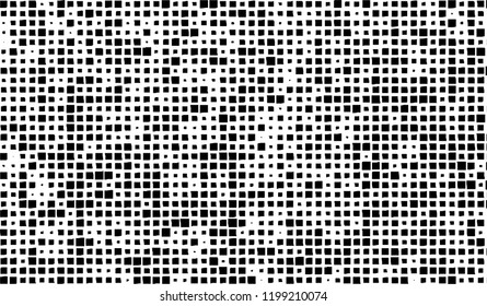 Abstract grunge texture of black squares on a white background