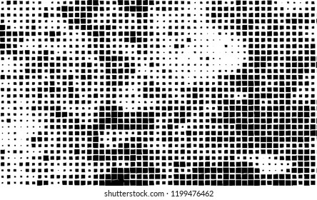 Abstract grunge texture of black squares on a white background