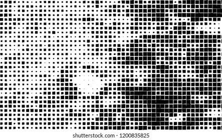 Abstract grunge texture of black squares on a white background