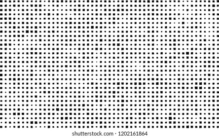 Abstract grunge texture of black squares on a white background