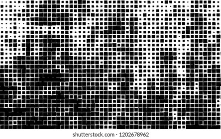 Abstract grunge texture of black squares on a white background
